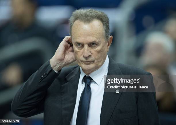 Alba's coach Aito Garcia Reneses watches the game during the Eurocup basketball match between ALBA Berlin and Lietuvos Rytas Vilnius in Berlin,...