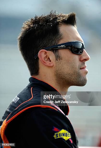 Aric Almirola, driver of the Graceway Pharm/AKawareness.com Toyota, stands on the grid during qualifying for the NASCAR Camping World Truck Series...