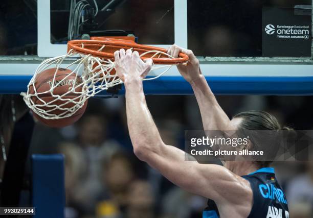 Alba's Dennis Clifford scores a point during the Eurocup basketball match between ALBA Berlin and Lietuvos Rytas Vilnius in Berlin, Germany, 01...