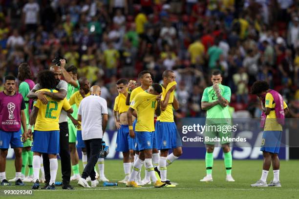 Assistant Coach of Belgium Thierry Henry consoles Marcelo of Brazil during the 2018 FIFA World Cup Russia Quarter Final match between Brazil and...