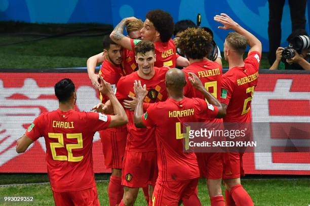 Belgium's players celebrate their second goal during the Russia 2018 World Cup quarter-final football match between Brazil and Belgium at the Kazan...
