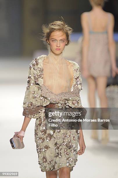 Model walks the runway at the Kenzo fashion show during Paris Fashion Week at Carreau du Temple on October 4, 2008 in Paris, France.