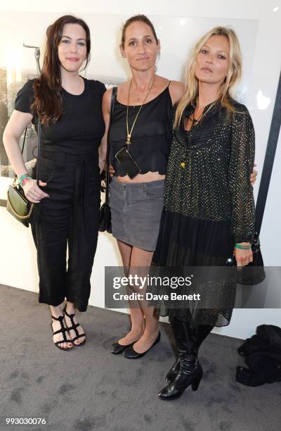 Liv Tyler, Rosemary Ferguson and Kate Moss attend the London launch of intothewhite, Darren Strowger's ambitious new tech platform raising money for...