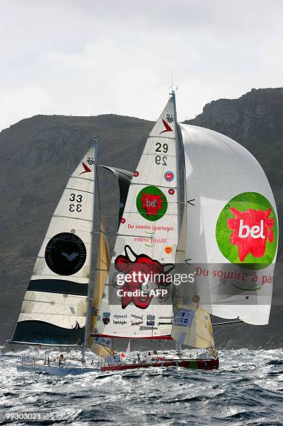 The "Groupe Bel" and "MemoiresStBarth.com" monohulls are seen upon their arrival at the end of the transat AG2R La Mondiale sailing race between...