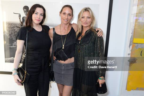 Liv Tyler, Rosemary Ferguson and Kate Moss attend the London launch of intothewhite, Darren Strowger's ambitious new tech platform raising money for...