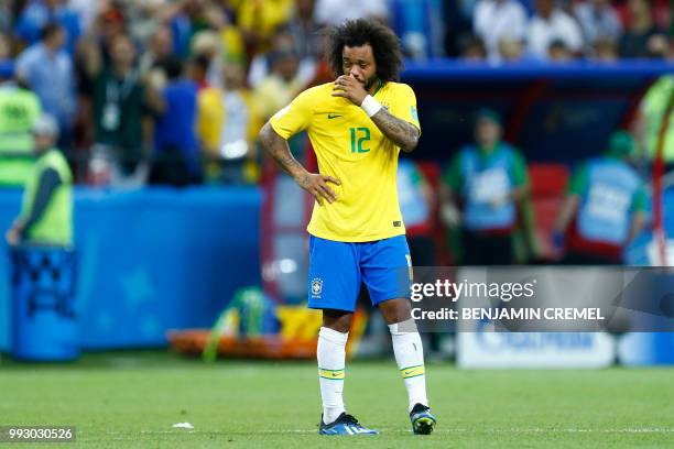 Brazil's defender Marcelo reacts to his team's defeat at the end of the Russia 2018 World Cup quarter-final football match between Brazil and Belgium...