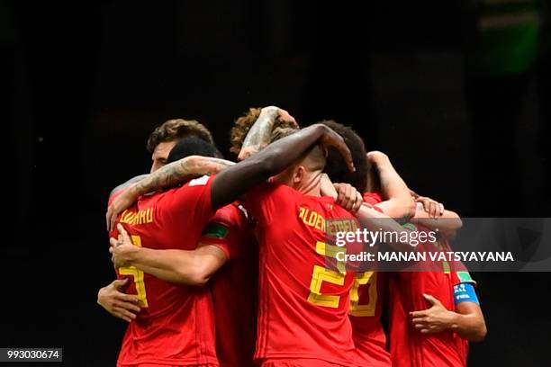 Belgium players celebrate their second goal during the Russia 2018 World Cup quarter-final football match between Brazil and Belgium at the Kazan...