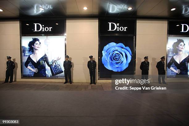 Special security is put in place at the Plaza 66 for the opening of a new Dior shop on May 14, 2010 in Shanghai, China. The ribbon cutting ceremony...