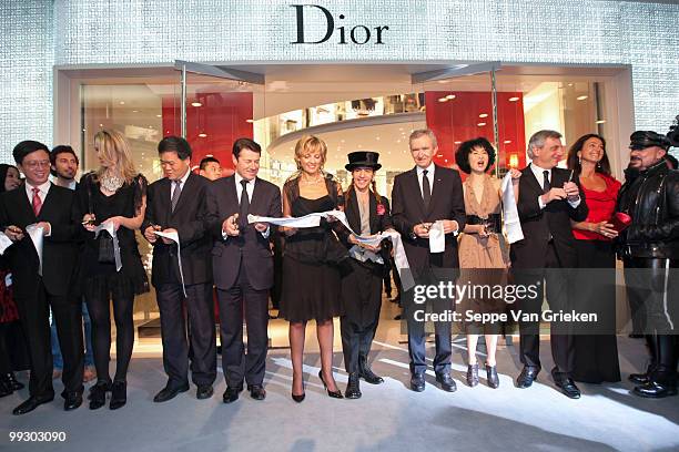 The ribbon cutting ceremony of the new Dior Shop in Shanghai, attended by Maggie Chueng, Bernard Arnault, John Galliano, and Helene Arnault on May...