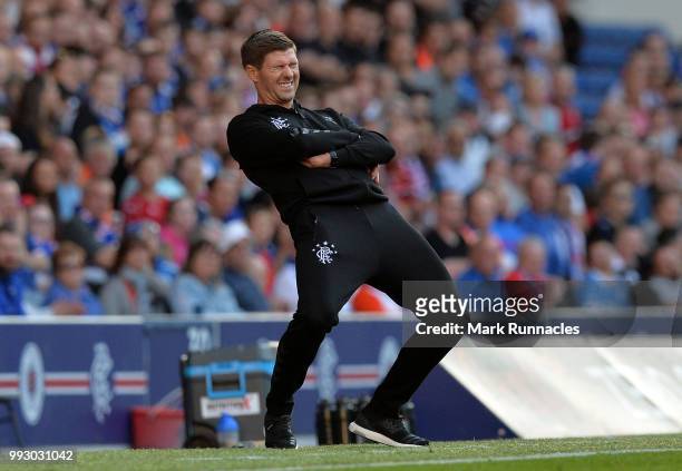 Rangers manager Steven Gerrard reacts on the side line as he watches his team comfortably beat Bury 6-0 during the Pre-Season Friendly between...
