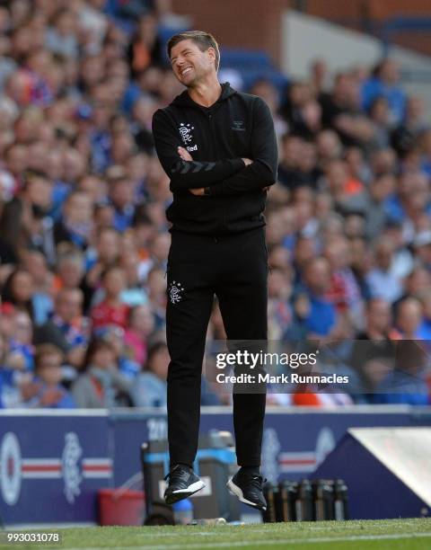 Rangers manager Steven Gerrard reacts on the side line as he watches his team comfortably beat Bury 6-0 during the Pre-Season Friendly between...