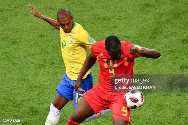 Belgium's forward Romelu Lukaku vies with Brazil's midfielder Fernandinho during the Russia 2018 World Cup quarter-final football match between...