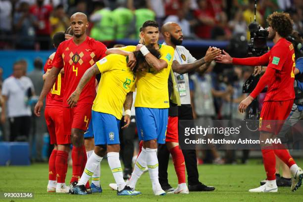 Marcelo of Brazil is consoled by Thiago Silva of Brazil at the end of the 2018 FIFA World Cup Russia Quarter Final match between Brazil and Belgium...