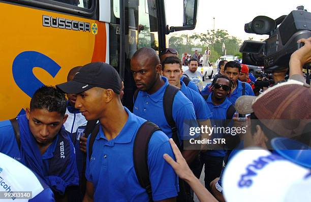 Honduran players Emilio Izaguirre, Donis Escober, Osman Chavez, Ricardo Canales, Walter Martinez and Noel Valladares come down the bus at Ramon...