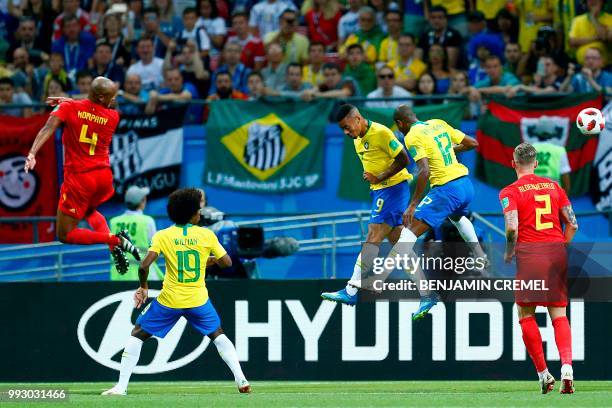 The ball, shot by Belgium's defender Vincent Kompany , hits Brazil's midfielder Fernandinho scoring an own goal during the Russia 2018 World Cup...