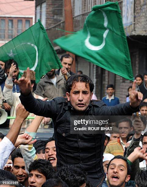 Supporters of the All Parties Hurriyat Conference shout pro-freedom slogans during a pro-freedom rally in Srinagar on May 14, 2010. The conglomerate...