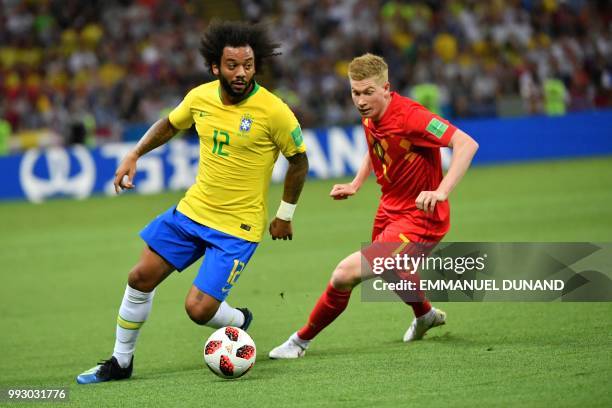 Brazil's defender Marcelo vies with Belgium's midfielder Kevin De Bruyne during the Russia 2018 World Cup quarter-final football match between Brazil...