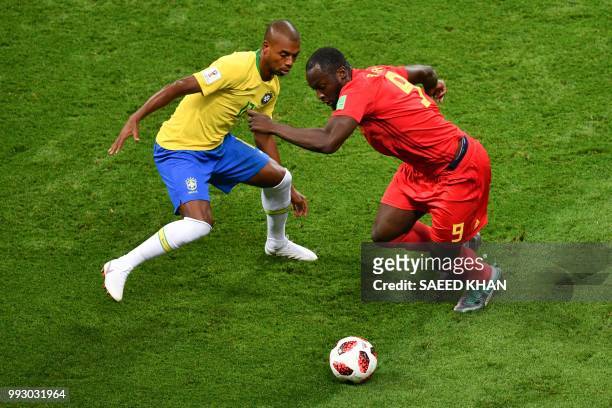 Belgium's forward Romelu Lukaku vies with Brazil's midfielder Fernandinho during the Russia 2018 World Cup quarter-final football match between...