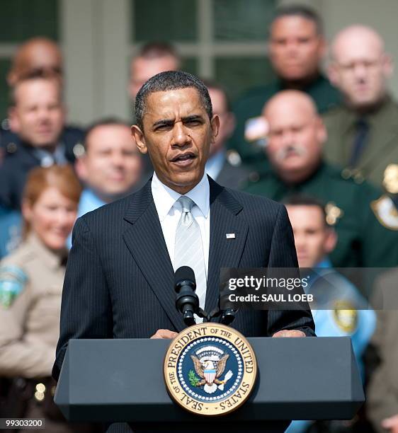 President Barack Obama speaks at a ceremony honoring the 2010 National Association of Police Organizations TOP COPS award winners in the Rose Garden...