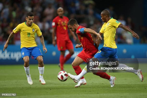 Belgium's forward Eden Hazard vies with Brazil's midfielder Fernandinho during the Russia 2018 World Cup quarter-final football match between Brazil...
