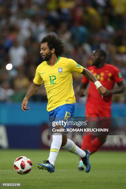 Brazil's defender Marcelo passes the ball during the Russia 2018 World Cup quarter-final football match between Brazil and Belgium at the Kazan Arena...