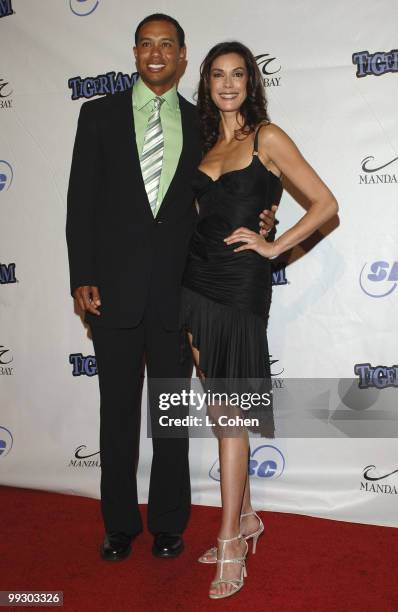 Tiger Woods and Teri Hatcher