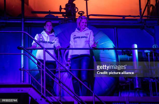 German beach volleyball gold medalists Laura Ludwig and Kira Walkenhorst participate in the presentation of the clothing for the Winter Olympic Games...