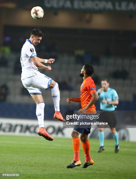 Hoffenheim's Sandro Wagner and Istanbul's Gael Clichy in action during the Europa League group C soccer match between Istanbul Basaksehir and 1899...