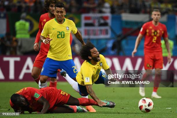 Brazil's defender Marcelo vies for the ball with Belgium's forward Romelu Lukaku during the Russia 2018 World Cup quarter-final football match...