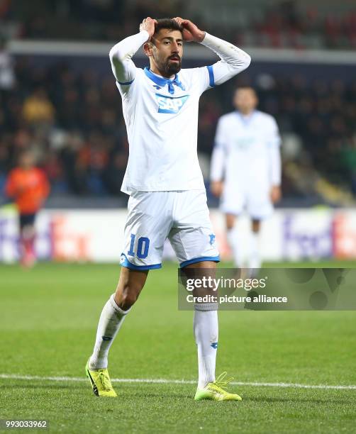 Hoffenheim's Kerem Demirbay reacts during the UEFA Europa League Group C football match against Istanbul Basaksehir at the Basaksehir Fatih Terim...