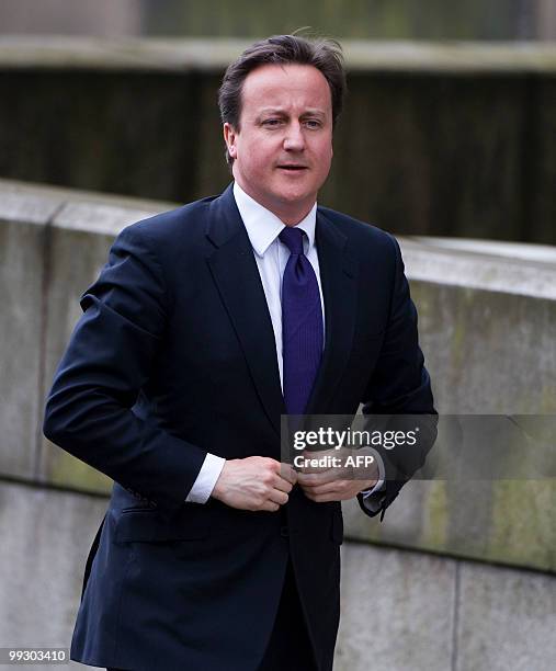 Britain's Prime Minister David Cameron arrives to meet with Leader of the Scottish National Party , Alex Salmond at St Andrews House, in Edinburgh,...