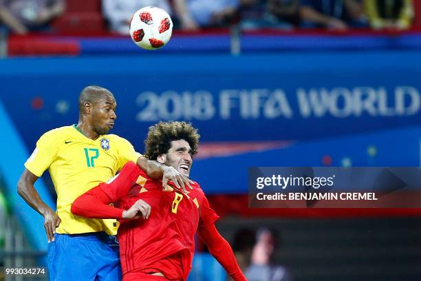 Brazil's midfielder Fernandinho vies with Belgium's midfielder Marouane Fellaini during the Russia 2018 World Cup quarter-final football match...