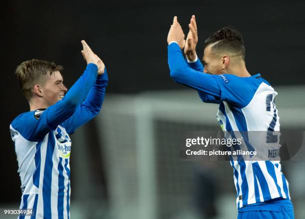 Berlin's Maximilian Mittelstaedt and Davie Selke cheer over the 2-0 win after the Europa League group J soccer match between Hertha BSC and Zorya...