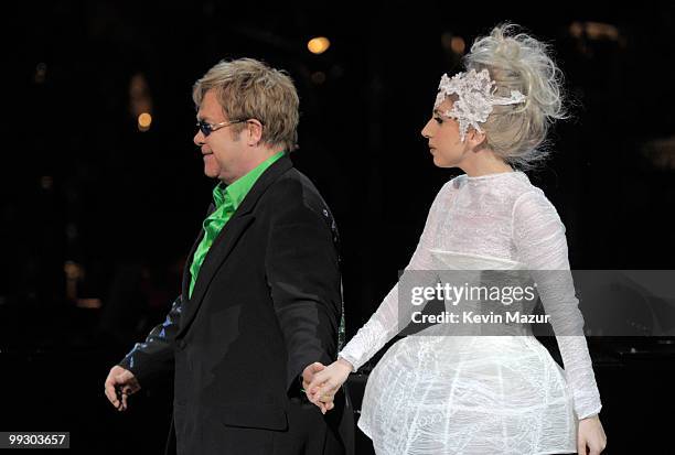 Elton John and Lady Gaga on stage during the Almay concert to celebrate the Rainforest Fund's 21st birthday at Carnegie Hall on May 13, 2010 in New...