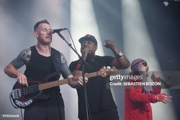 Singers and bassist of Prophets of rage band, B-Real , Chuck-D and Tim Commerford perform on stage during the 30th Eurockeennes rock music festival...