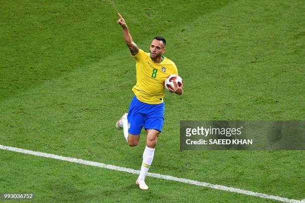 Brazil's midfielder Renato Augusto celebrates after scoring a goal during the Russia 2018 World Cup quarter-final football match between Brazil and...