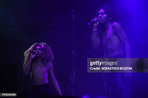 Members of South African band Faka, perform on stage during the 30th Eurockeennes rock music festival on July 6, 2018 in Belfort, eastern France.