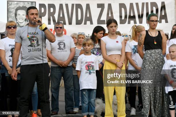 Davor Dragicevic, father of a student found dead in a stream in March, speaks during the 100th day of a demonstration asking for justice in Banja...