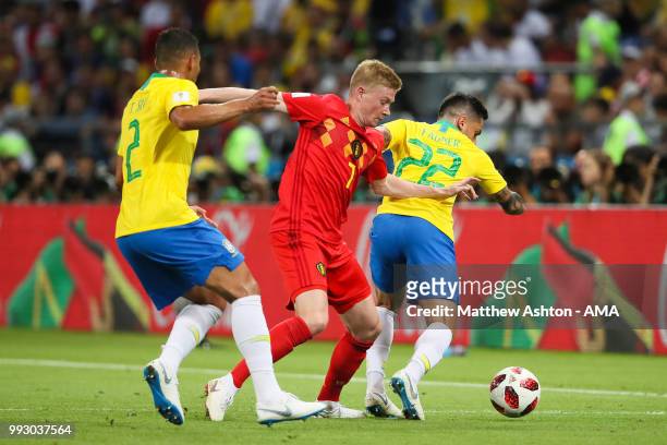 Kevin De Bruyne of Belgium competes with Thiago Silva of Brazil and Fagner of Brazil during the 2018 FIFA World Cup Russia Quarter Final match...