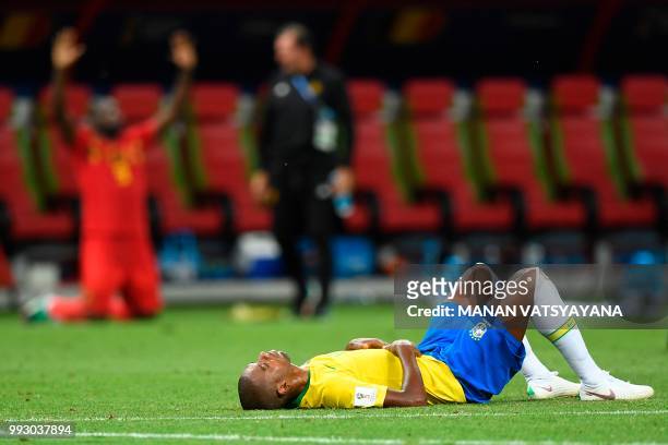 Brazil's midfielder Fernandinho reacts to their defeat at the end of the Russia 2018 World Cup quarter-final football match between Brazil and...