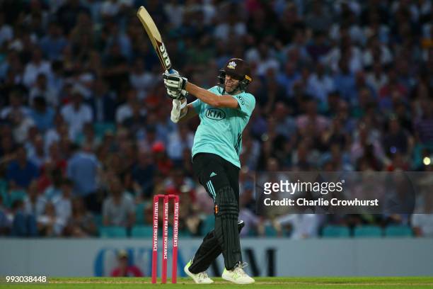 Morne Morkel of Surrey hits out during the Vitality Blast match between Surrey and Kent Spitfires at The Kia Oval on July 6, 2018 in London, England.