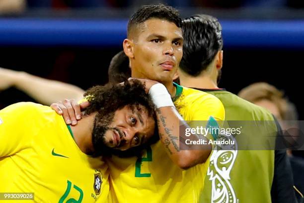 Marcelo and Thiago Silva of Brazil react after losing the 2018 FIFA World Cup Russia quarter final match between Brazil and Belgium at the Kazan...