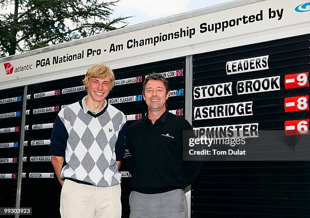 Professional Craig Laurence and amateur James Beardwell of Stock Brook Manor pose for photographs after winning the the Virgin Atlantic PGA National...