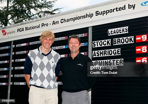 Professional Craig Laurence and amateur James Beardwell of Stock Brook Manor pose for photographs after winning the the Virgin Atlantic PGA National...