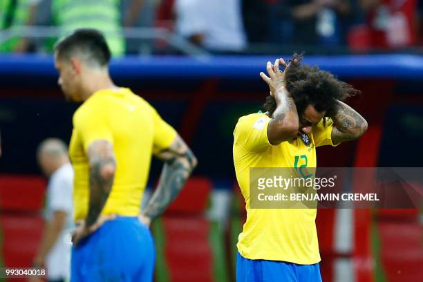 Brazil's defender Marcelo reacts to his team's defeat at the end of the Russia 2018 World Cup quarter-final football match between Brazil and Belgium...