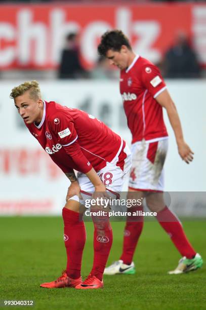 Kaiserslautern's Nils Seufert and Kaiserslautern's Patrick Ziegler standing on the playing field after the German 2nd division Bundesliga soccer...