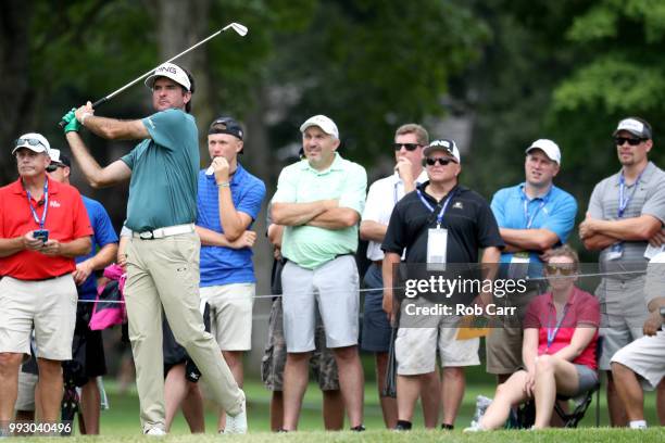 Bubba Watson follows his tee shot on the ninth hole during round two of A Military Tribute At The Greenbrier held at the Old White TPC course on July...