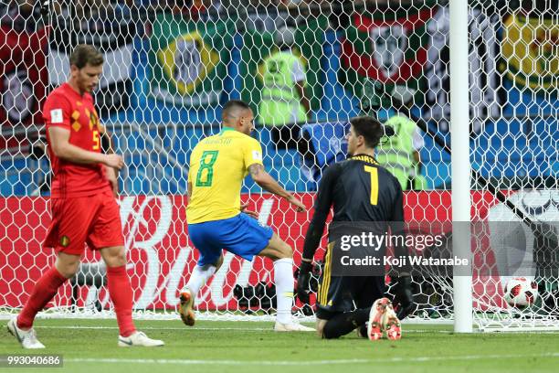 Renato Augusto of Brazil gathers the ball out the back of the net after scoring his sides first goal during the 2018 FIFA World Cup Russia Quarter...