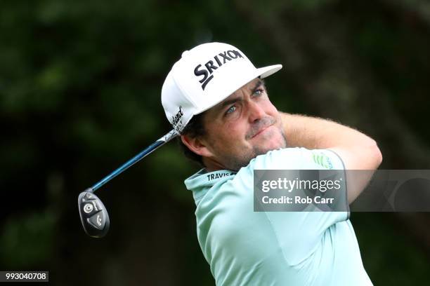 Keegan Bradley follow his tee shot on the ninth hole during round two of A Military Tribute At The Greenbrier held at the Old White TPC course on...