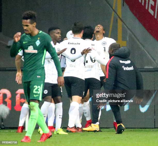 Frankfurt's Sebastien Haller celebrates his 2-1 goal with team mates Luka Jovic, Makoto Hasebe, Taleb Tawatha, Theodor Gebre Selassie during the...